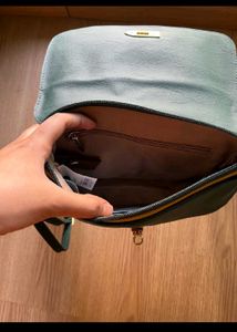 New Baggit Sling Bag In Unique Green Color