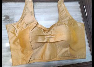 Gold Sleeveless Blouse