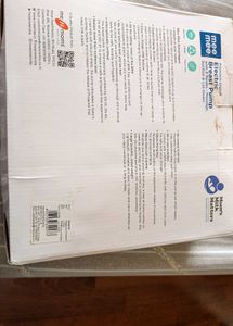 Electric Breast Pump With Feeding Bottle.