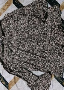 leopard-print top with pearl buttons