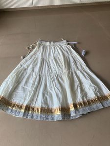 Fix price cream and golden skirt