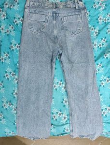 High-Waisted Denim Jeans with Daisy Embroidery.
