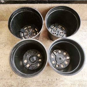 4 Black Plastic Plant Pots