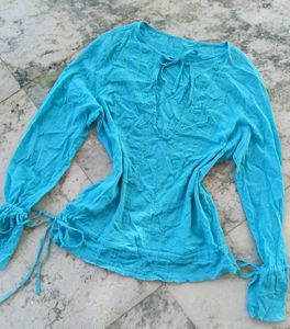 Light blue low-cut neck top