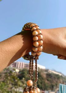 Elegant Pearl Bangle with Tassels