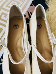Elegant White Ballerinas