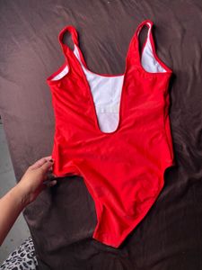 imported Red Canada bodysuit