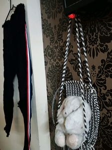 Black One Leg Knee Cut Jeans