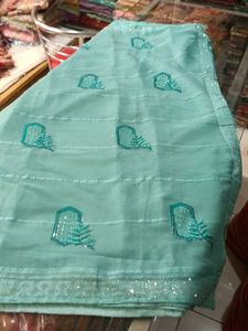 Elegant Teal Embroidered Pyar Wear Saree