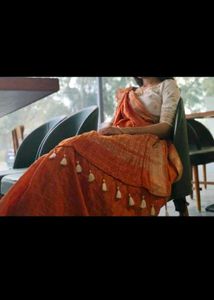 Orange Saree With Beautiful Tassel
