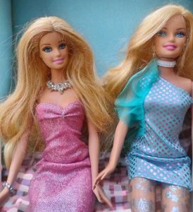 Two Glamorous Barbie Dolls