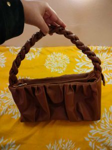 A Brown Colour Handbag