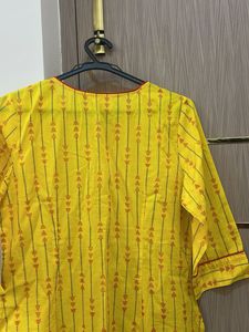 Yellow Printed Kurta And Red Pallazzo