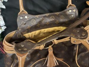 Louis Vuitton Logo Handbag with tassel