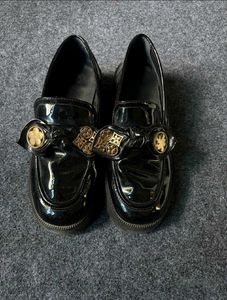 Black Loafers with Bow Detail