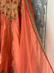 Elegant Orange Kurta Set with Embroidered Details