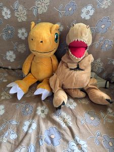Dinosaur Plushies And Bag