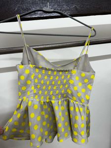 Polka Dot Peplum Cami Top