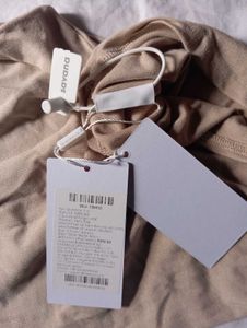 Beige Sleeveless Mock Neck Top