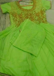 Elegant Green Embroidered Dress with Gold Detailin