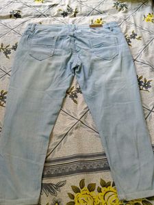 Short Ankle Length Ripped Jeans For Women