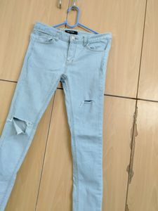 Low Waist Light Blue Ripped Jeans