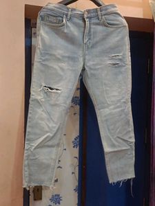 Ripped Light Wash Denim Jeans