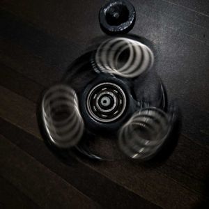 Black Claw-Style Fidget Spinner (One Cap Damaged)