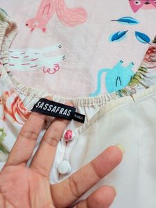 SASSAFRAS Floral Peplum Top