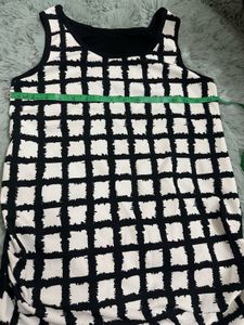 Imported Top With Sheer Back