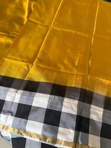 golden yellow and checkered border pure silk saree