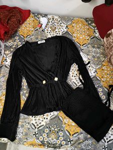 Black Plisse Peplum Top