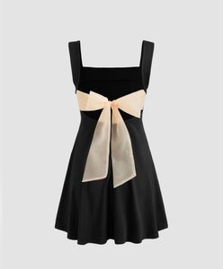 Chic Black Mini Dress with Bow Detail