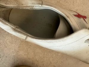 Worn White Sneakers