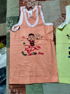 Three Baby Vests