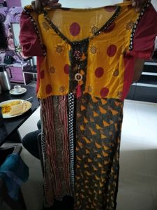 Yellow Tunic with Embellishments