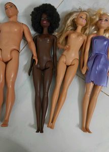 Lot of 11 Barbie Dolls