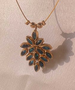 Elegant Gold &amp; Teal Pendant Necklace