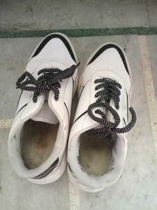 white and black women&#39;s sneakers