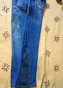 Distressed Denim Jeans
