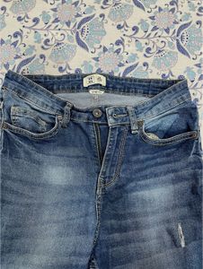 Ripped High-Waisted Jeans