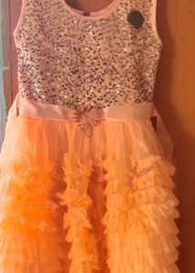 Girls' Sparkly Peach Ruffle Dress