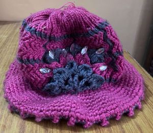 Handmade Crocheted Hat with Floral Embellishment