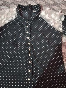 A Black Polyster Top With White Dots Nd Classic .