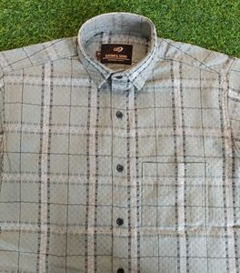 Elevate your style with this classic checked shirt