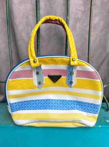 Set Of 4 Mini Handbags.