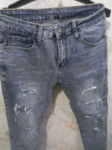 Ripped Gray Wash Jeans