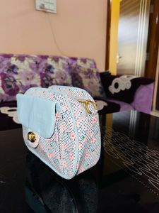 Sky Blue Sling Bags.