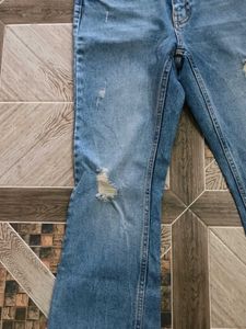 Distressed Bootcut Jeans