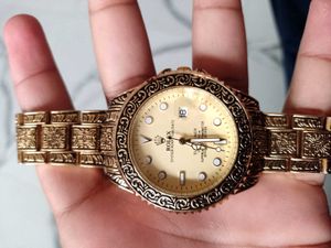 Ornate Gold Rolex Oyster Perpetual Date